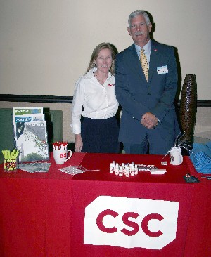 Elizabeth Birch and Dave Grundies work the CSC table during the November networking event.